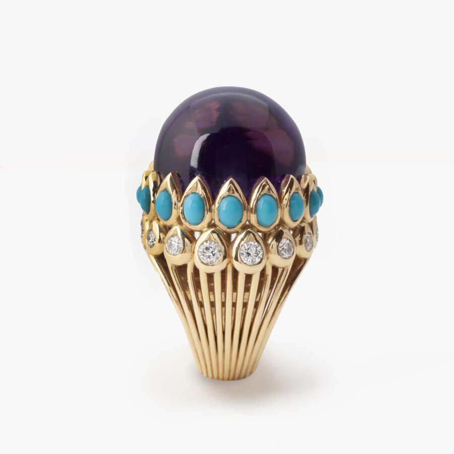 An eighteen carat yellow gold ring set with amethyst, turquoises and brilliant cut diamonds. Signed Cartier Paris, made ca 1960, and numbered. 