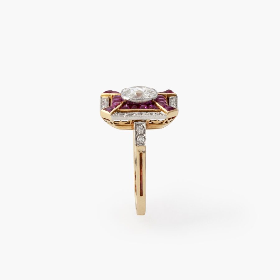 An eighteen carat yellow gold and platinum Art Deco ring, set with old brilliant cut diamonds and calibré cut rubies, made in France, ca 1910.