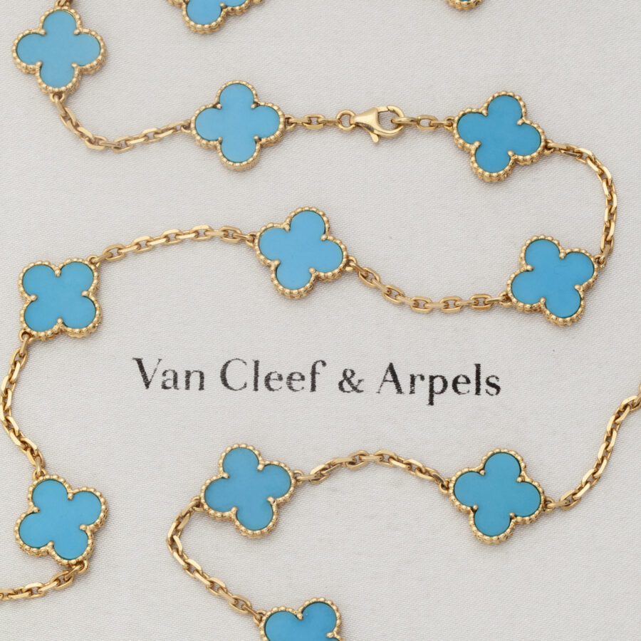 An eighteen carat yellow gold “Alhambra” longchain set with turquoise. Signed Van Cleef & Arpels and numbered. With pouch and certificate dated 2007.