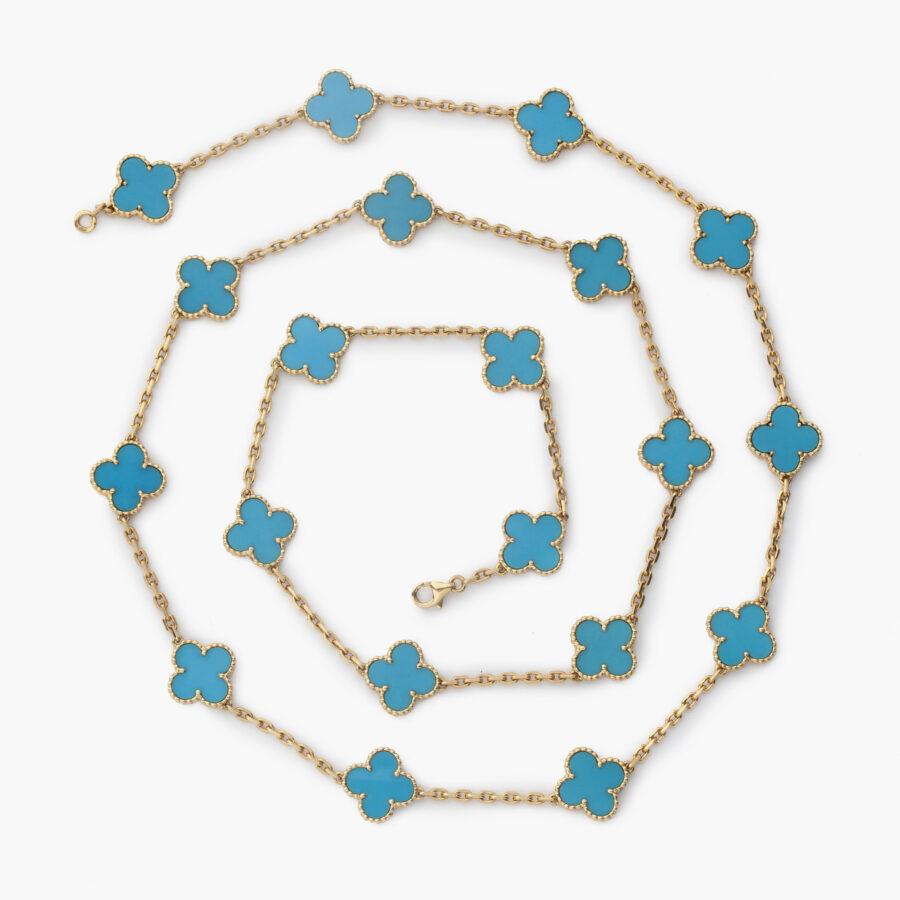 An eighteen carat yellow gold “Alhambra” longchain set with turquoise. Signed Van Cleef & Arpels and numbered. With pouch and certificate dated 2007.