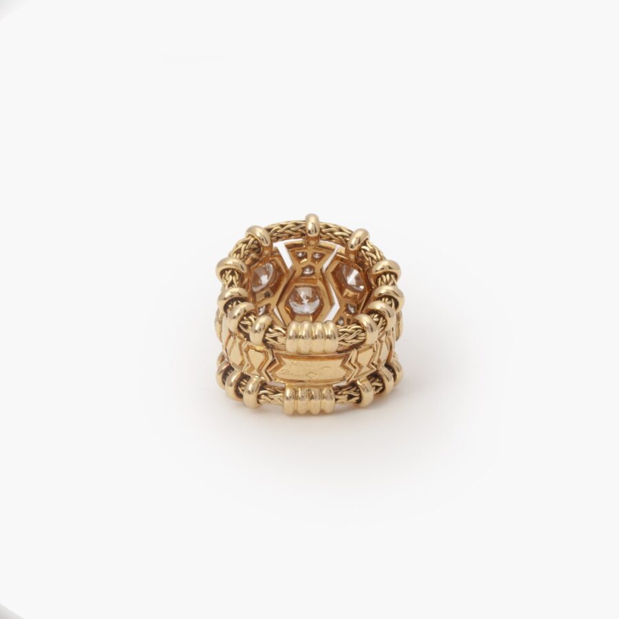 An eighteen carat yellow gold ring “Passementerie”, set with brilliant cut diamonds. Signed Rene Boivin, made in Paris, ca 1950.