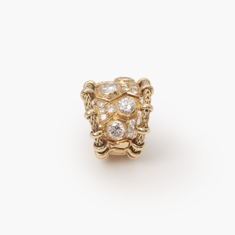 An eighteen carat yellow gold ring “Passementerie”, set with brilliant cut diamonds. Signed Rene Boivin, made in Paris, ca 1950.