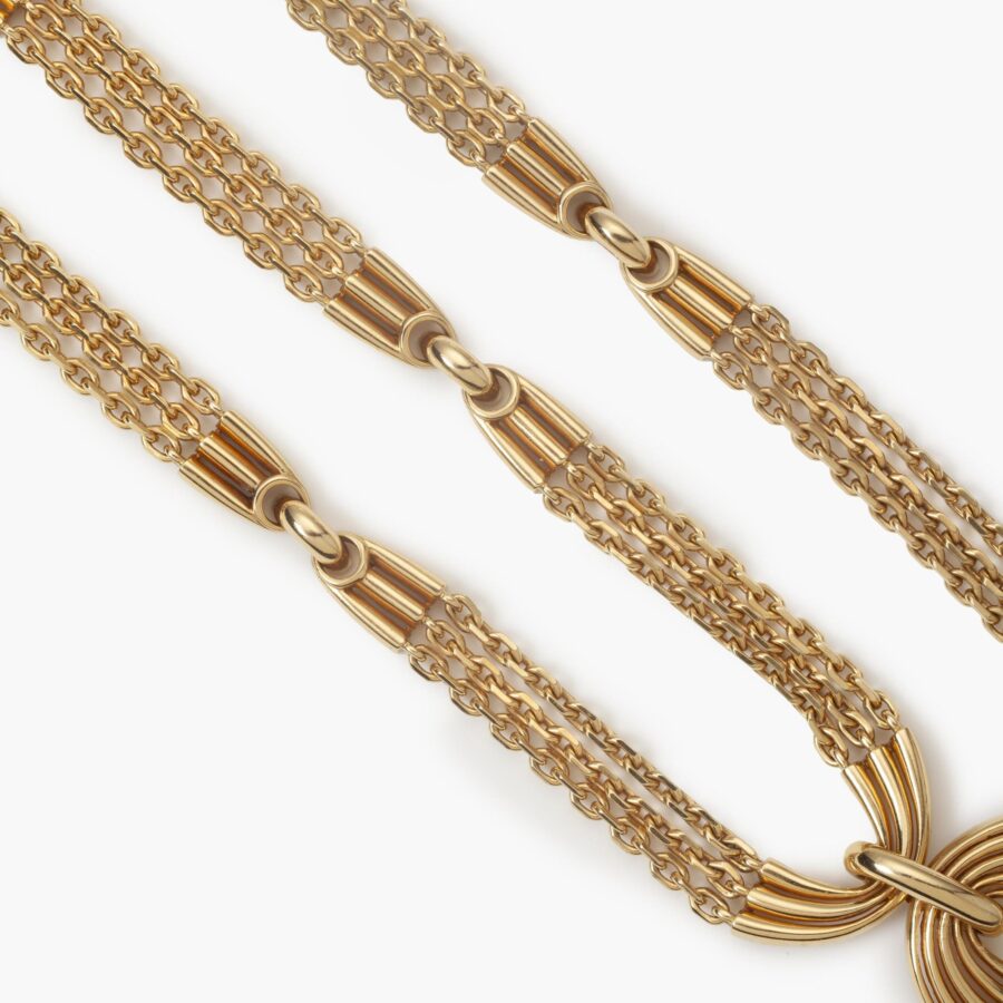 A yellow gold necklace; to be worn als longchain, as short necklace with bracelet, with or without pendant or the pendant seperate. Van Cleef & Arpels, Paris, ca 1970. 