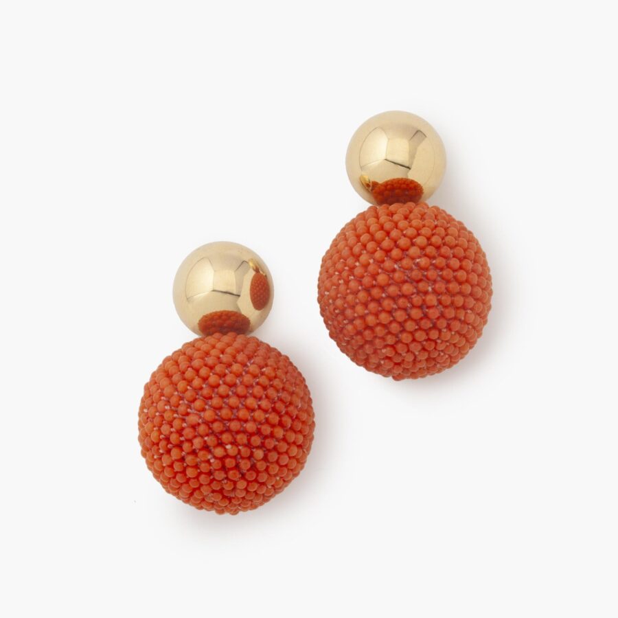 A pair of eighteen carat yellow gold clip earrings, designed as a sphere decorated with coral beads. Signed Hemmerle, Munich.