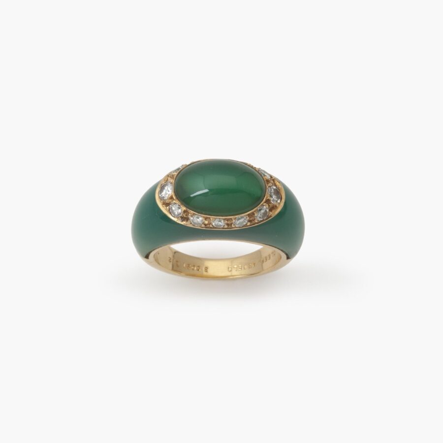 An eighteen carat yellow gold ring set with green agate and brilliant cut diamonds. Signed Van Cleef & Arpels, made in Paris, ca 1980 and numbered.