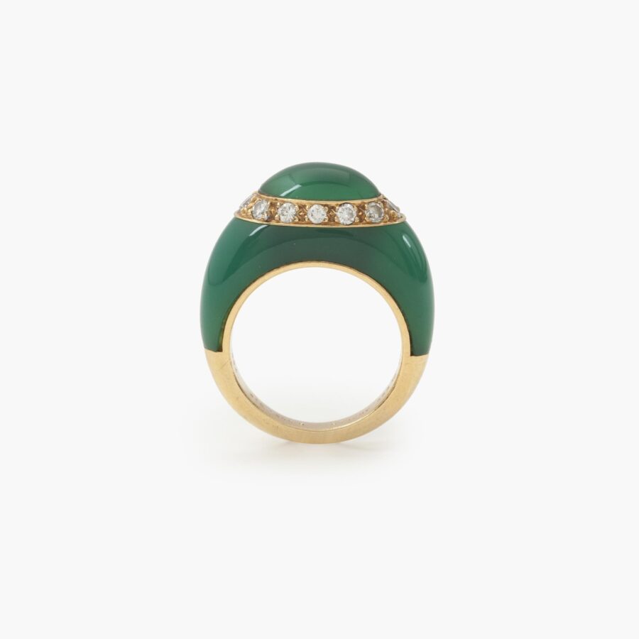 An eighteen carat yellow gold ring set with green agate and brilliant cut diamonds. Signed Van Cleef & Arpels, made in Paris, ca 1980 and numbered.