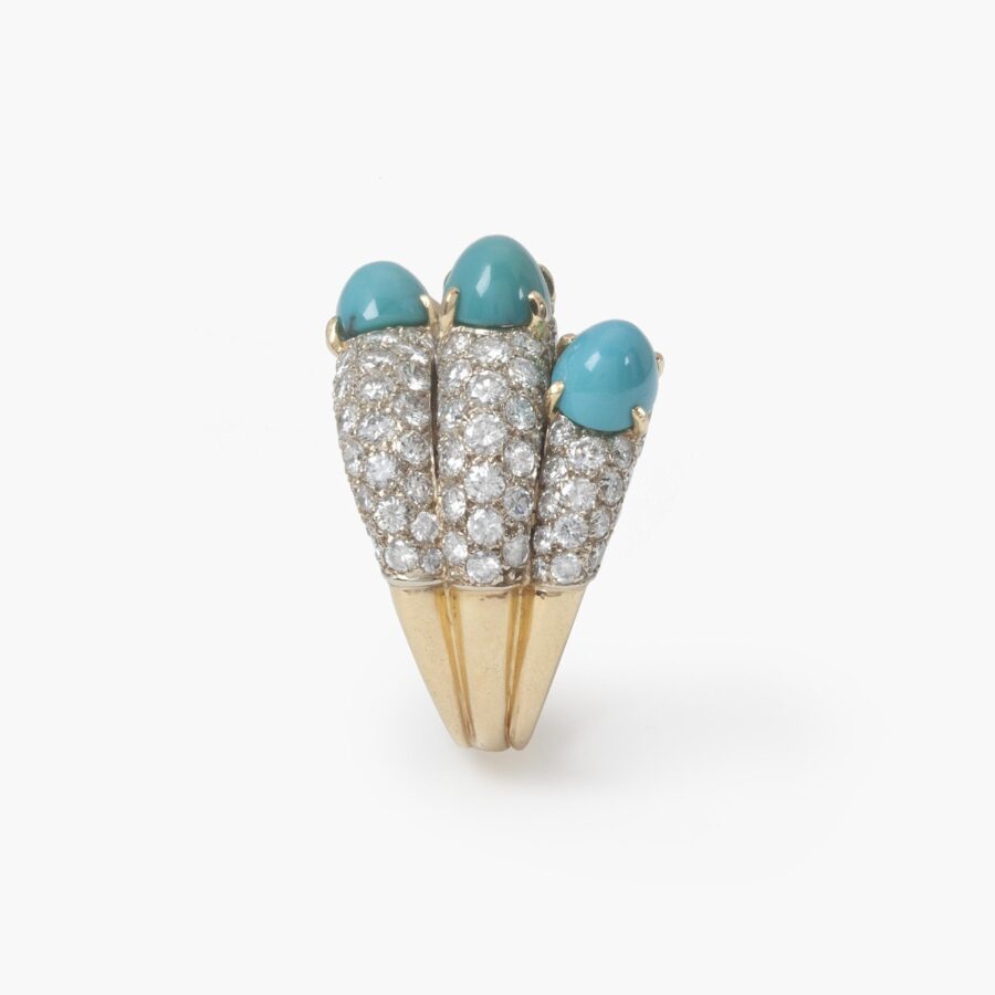 An eighteen carat yellow gold and platinum ring of triple bombé design, set with diamonds and turquoise. Signed Cartier Paris, made ca 1960.