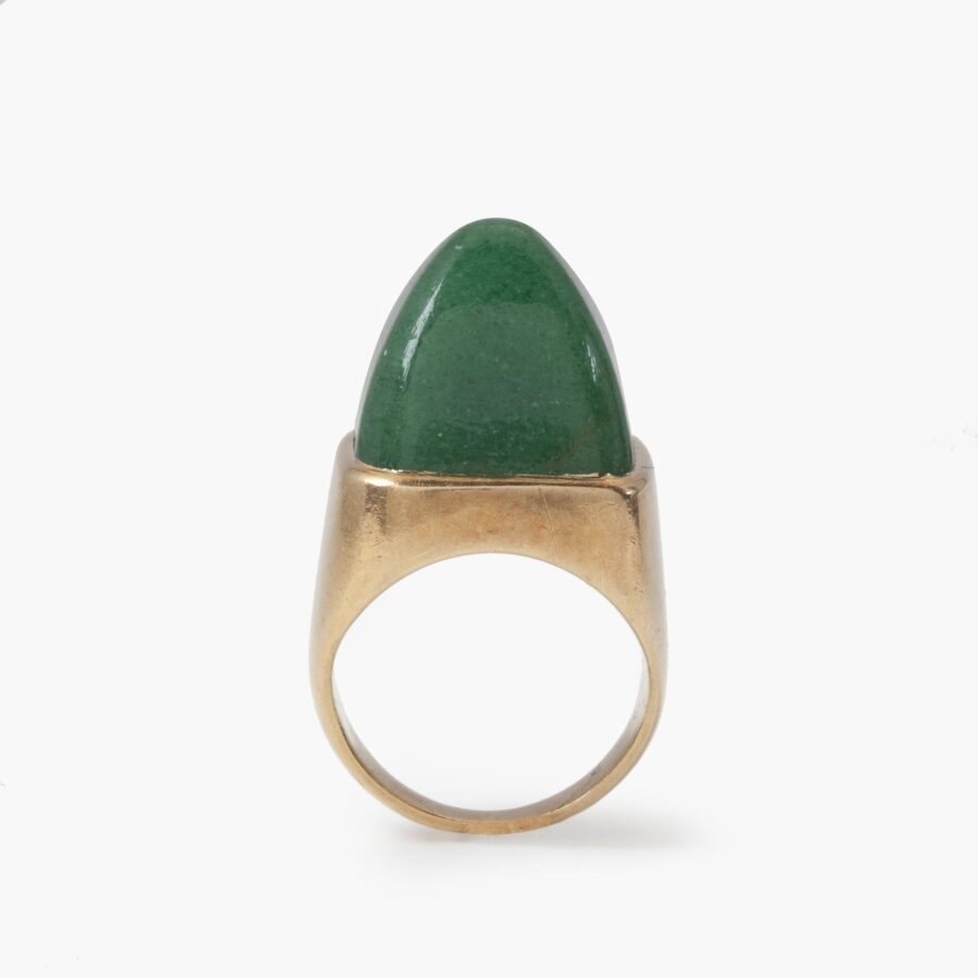 An eighteen carat yellow gold ring set with a high square cabochon cut aventurine. Signed Jean Fouquet, made in Paris, circa 1940.