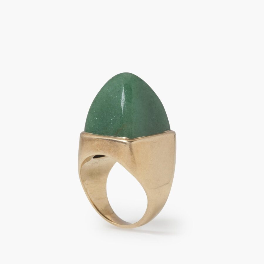 An eighteen carat yellow gold ring set with a high square cabochon cut aventurine. Signed Jean Fouquet, made in Paris, circa 1940.