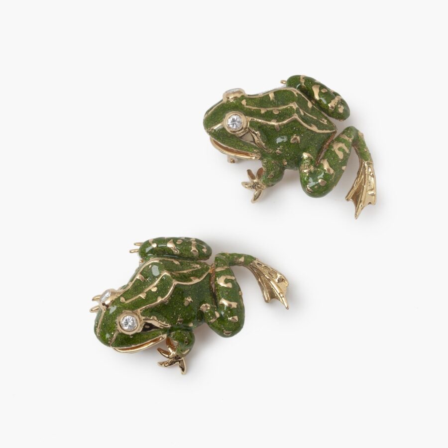 A pair of eighteen carat yellow gold brooches, each designed as a frog, with green enamel and diamond eyes. Signed Van Cleef & Arpels, Paris, 1966.